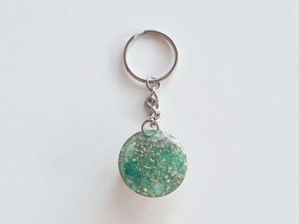 porte clé orgonite rond vert fleur de vie